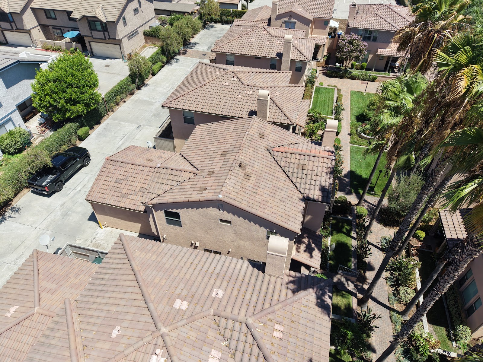 Aerial overview of multiple Southern California tile rooflines